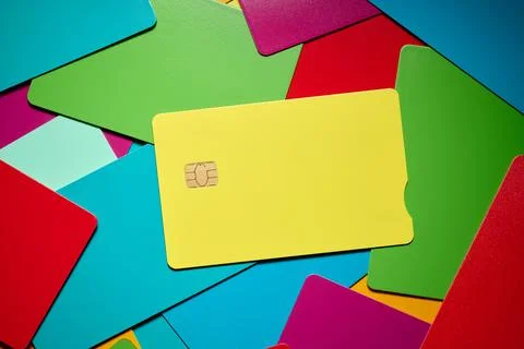 Closeup of a stack of multicolored microchip debit cards. Stock Photos