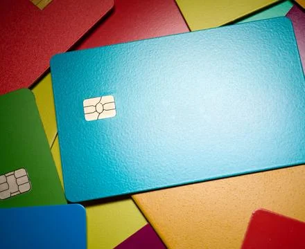 Closeup of a stack of multicolored microchip debit cards. Stock Photos