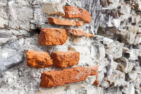 Closeup of Stack of Raw Bricks on the external wall 写真素材