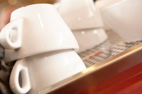 Closeup of Stacks of Clean White Espresso Cups Stock Photos