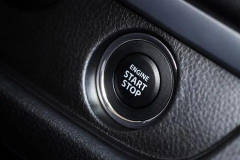 Closeup start engine button of modern car Stock Photos