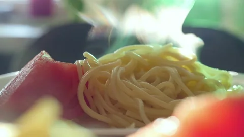 Closeup steam going up from just cooked delicious spaghetti pasta with tomatoes Stock-Footage 195204750