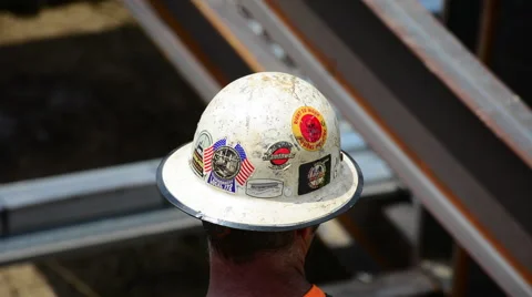 Closeup of a steelworker's hard hat Stock Footage 47576341