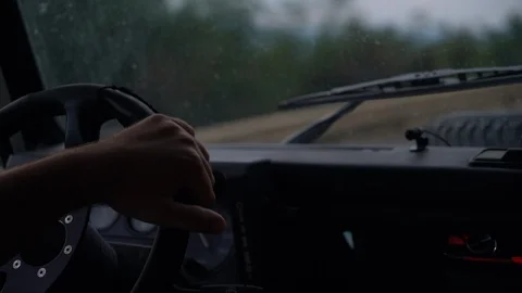 Closeup of steering wheel while driving Stock Footage 125768790