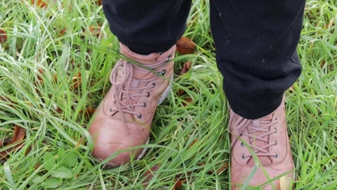 Closeup of step on moist field, freshness defines tactile connection, fresh.. Stock Footage 320735912