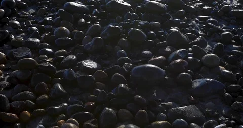 Closeup of a stony beach at evening Stock Footage 87777601