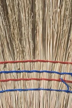 Closeup of straw broom Stock Photos
