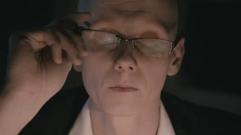 Closeup of A Stressed accountant dealing with paperwork Stock Footage 258482479