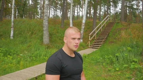 Closeup of strong athlete preparing before pull-ups Video stock 83818908