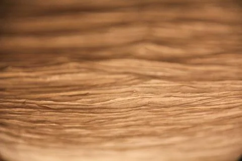 Closeup from structured paper with light. Stock Photos