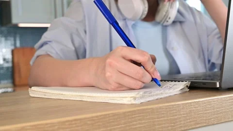 Closeup of a student writing down lecture or plan,preparing for exam Stock Footage 198075308