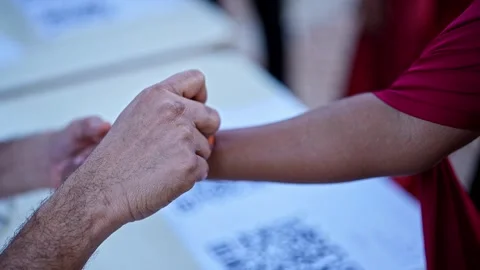 Closeup of Students stamping on Hand During Graduation Celebration Ceremony.. Video stock 331788783