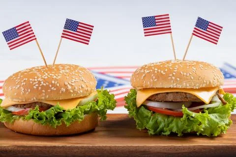 Closeup studio shot of two delicious tasty minced pork beef cheeseburgers w.. Stock-Fotos