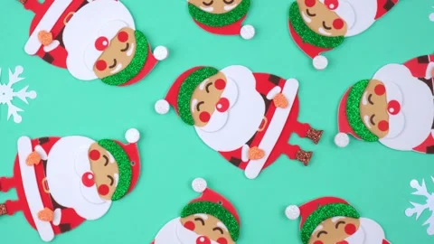 Closeup stylized decorative Santa Claus figures rotate. christmas background. Stock Footage 244530573