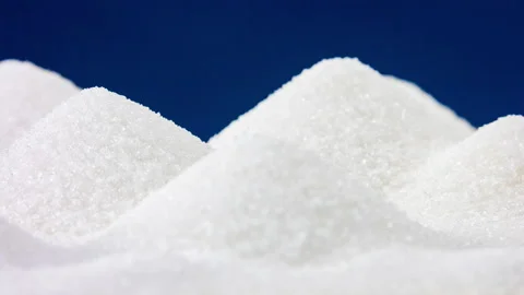 Closeup sugar, piled up the shape of the hills macro background rotation Stock Footage 89820536