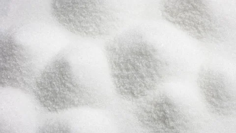 Closeup sugar, piled up the shape of the hills macro background rotation Stock Footage 89820586