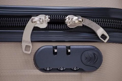 Closeup of suitcase with combination lock and zero numbers Stock Photos