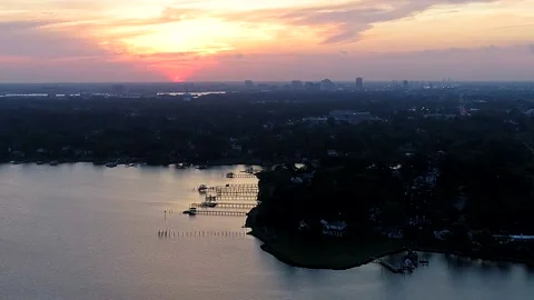 Closeup of a Sunrise time lapse over Portsmouth Virginia Stock Footage 107316235
