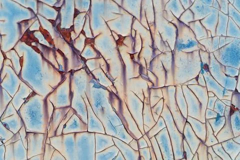 Closeup of Surface peeling old car paint cracked with rusty background Stock Photos