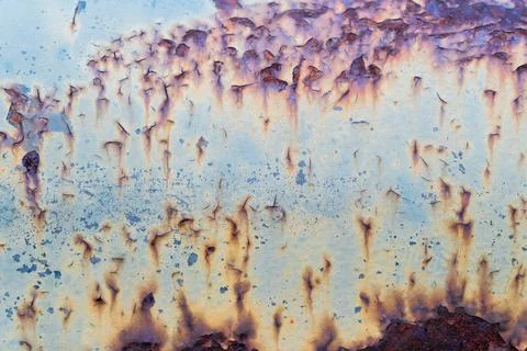 Closeup of Surface peeling old car paint cracked with rusty background Stock Photos