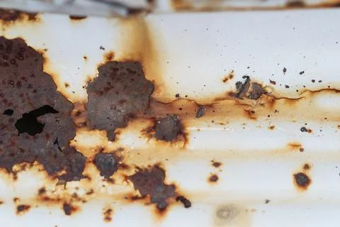 Closeup of Surface peeling old car paint cracked with rusty background Stock Photos