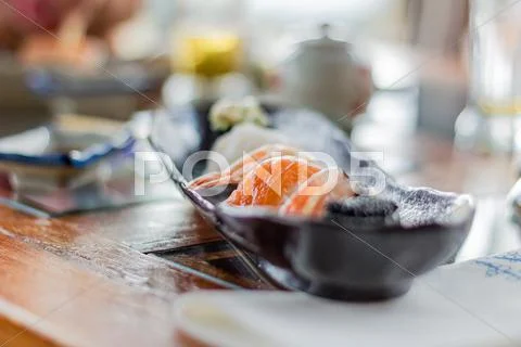 Closeup of sushi set on black plate Stock Photos