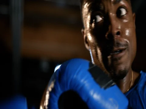 Closeup of a sweaty man boxing Video stock 83375175