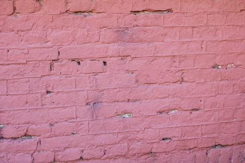 Closeup of a symmetrical pattern of brown brickwork rectangles 스톡 사진
