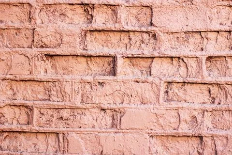 Closeup of a symmetrical pattern of brown brickwork rectangles Stock Photos