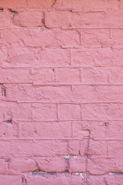Closeup of a symmetrical pattern of brown brickwork rectangles Stock Photos