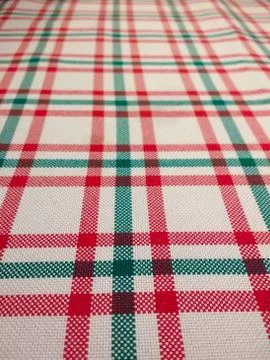 Closeup of Tablecloth with checkered pattern on white background Stock Photos