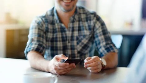 Closeup of a talking man at cafe. 写真素材