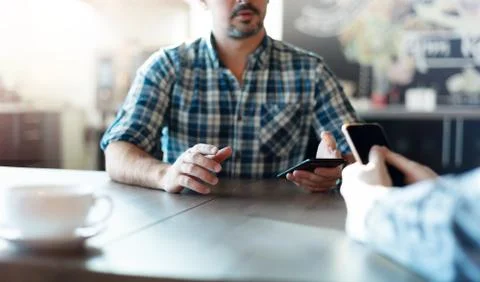 Closeup of a talking man at cafe. 写真素材