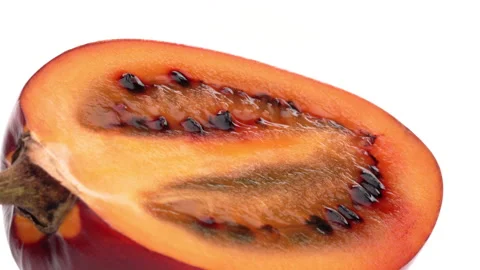Closeup of tamarillo fruit pulp. Isolated on white background. Stock Footage 161030193