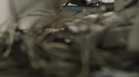 Closeup of Tangled Wires with LED Light Blinking in Background 動画素材 68723639