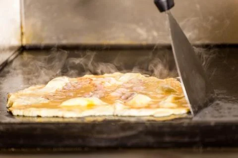 Closeup of Tasty  Fried Scrambled Egg on Grilling Panel Stock Photos