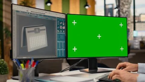 Closeup of technician using green screen PC to create solar powered device Stock Photos