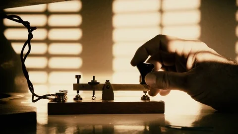 Closeup of a telegrapher sending morse code 4k Video stock 79654716
