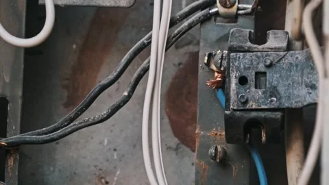 Closeup of Terminal Connections in an Electrical Box Stock Footage 303865833