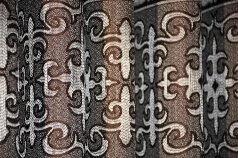 Closeup of a textile made of tiny beads creating an intricate design pattern Foto stock