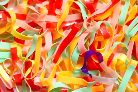 Closeup texture background of many the rubber band for use to tie the hair. Stock Photos