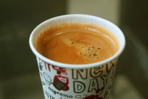 Closeup the Texture of Hot Coffee Surface in a Paper Cup Stock Photos