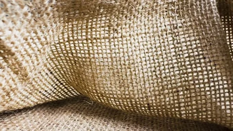 Closeup texture of a rough brown burlap fabric sack Stock-Footage 340581120