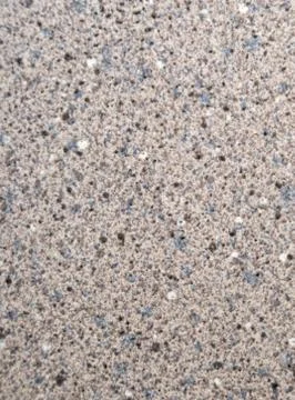 Closeup texture of the surface of a restroom counter top. with offwhite tones Stock Photos