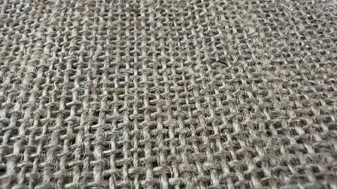 Closeup texture of woven natural burlap fabric Stock Footage 340581140