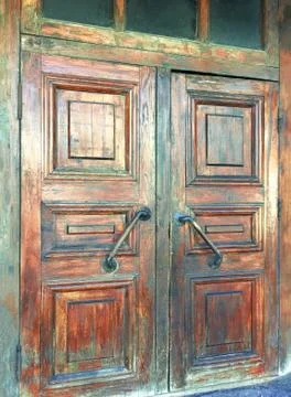 Closeup of textured door with handle. Photos