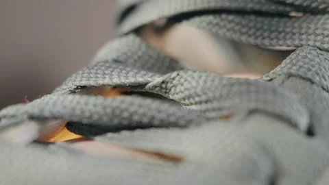 Closeup of textured shoelaces. Highresolution image highlighting detailed Stock Footage 345203475