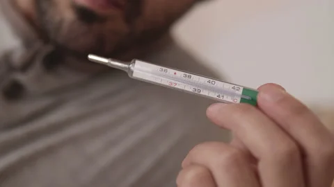 Closeup of thermometer, fever or sickness concept Video stock 163032095