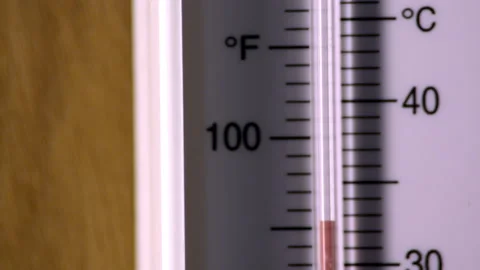 Closeup of thermometer passing 100, heat wave, temperature Stock Footage 146422331