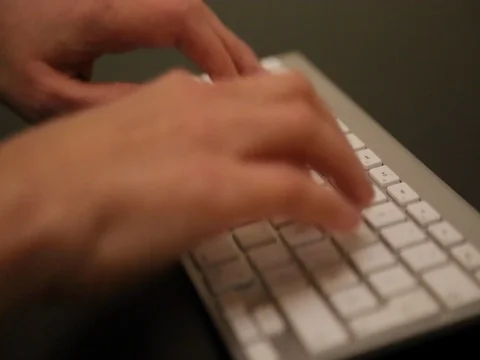 Closeup thin fingers typing keyboard Stock Footage 73306814